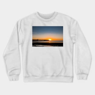 North Sea sunrise at the mouth of the River Blyth Crewneck Sweatshirt